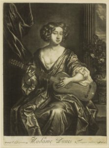 Mary Davis mit einer Gitarre in der Hand